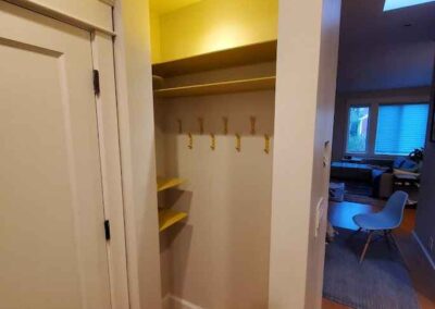 Reverse an existing  closet to create a coat closet by the front door in Bernal Heights, San Francisco